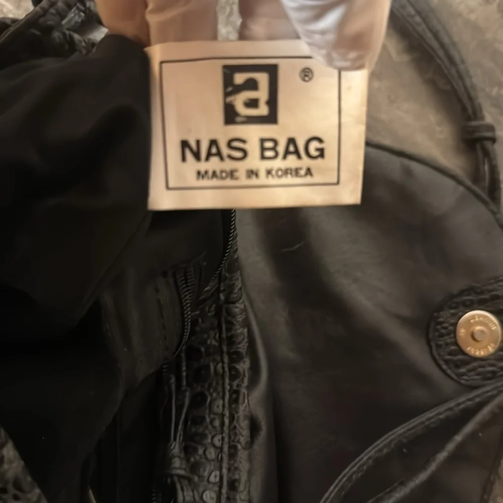 NAS Shoulder Bag. Crocodile  print